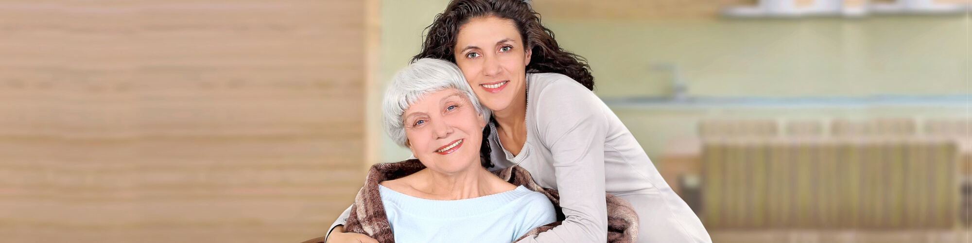 elderly and woman smiling